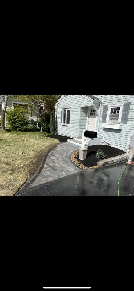 Custom yard cleanup service with custom design in Warwick, RI by BJK Landscaping & Construction