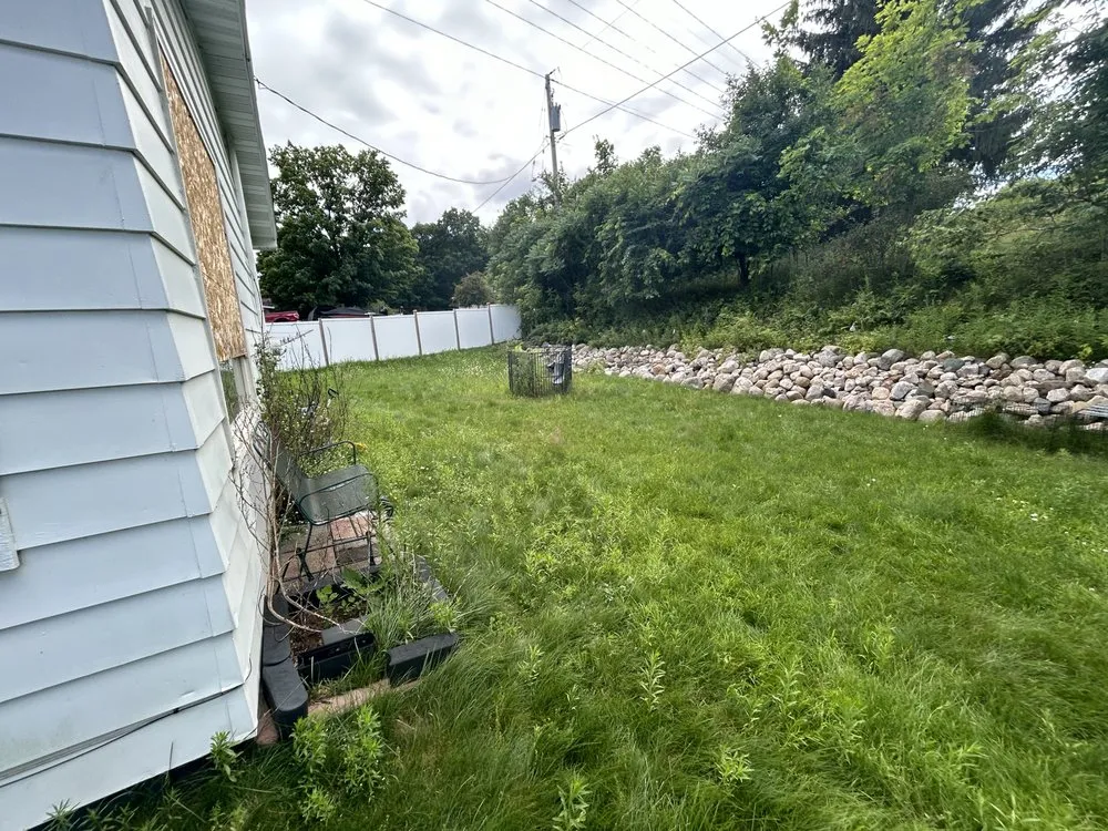 Affordable landscape design for year-round maintenance in Breitung Township, MI by BJK Outdoor Services