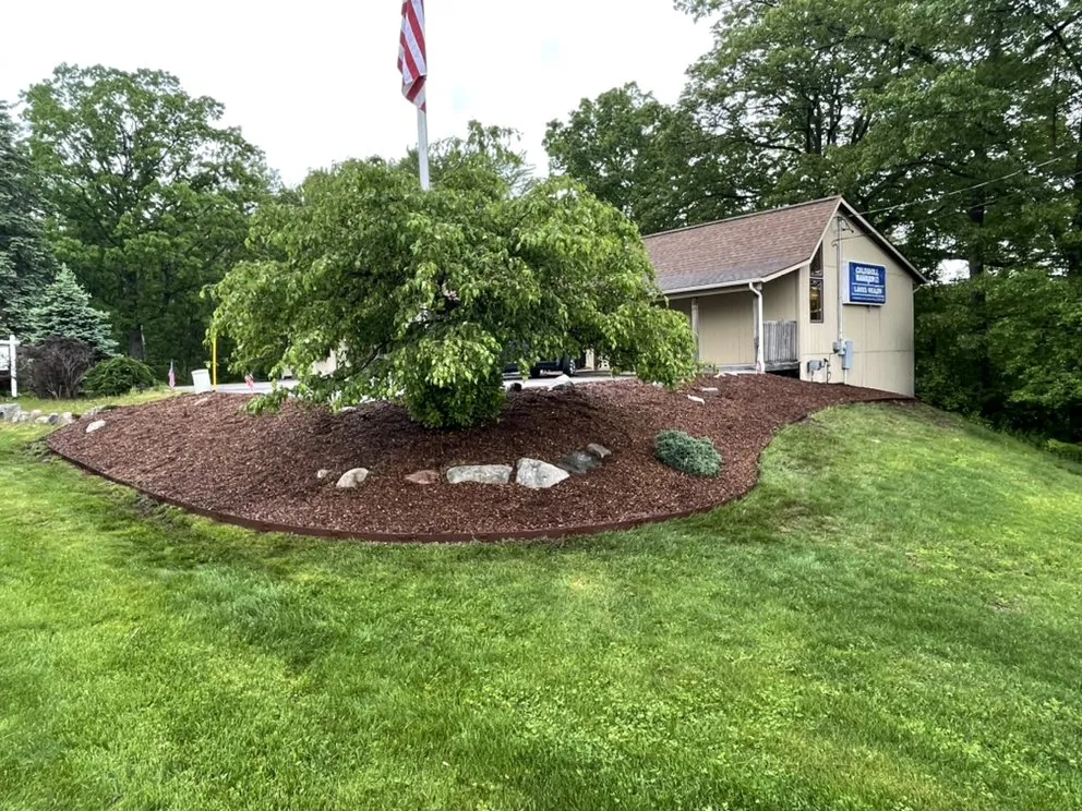 Custom landscape installation for homes in Morley, MI by BJ&L Lawn Service