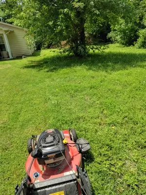 Blacctopvets Lawn Care Logo