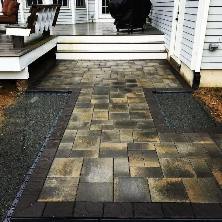 Custom garden landscaping for year-round maintenance in Brockton, MA by Black Diamond