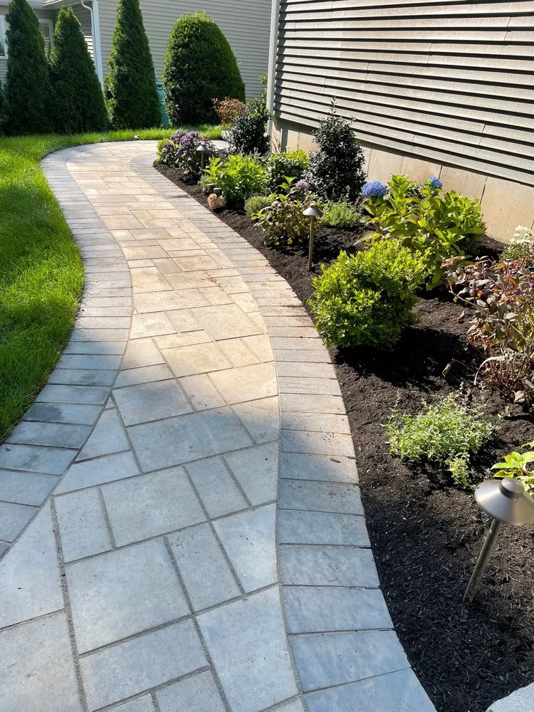 Professional landscape installation with custom design in Woburn, MA by Black Diamond Landscapes