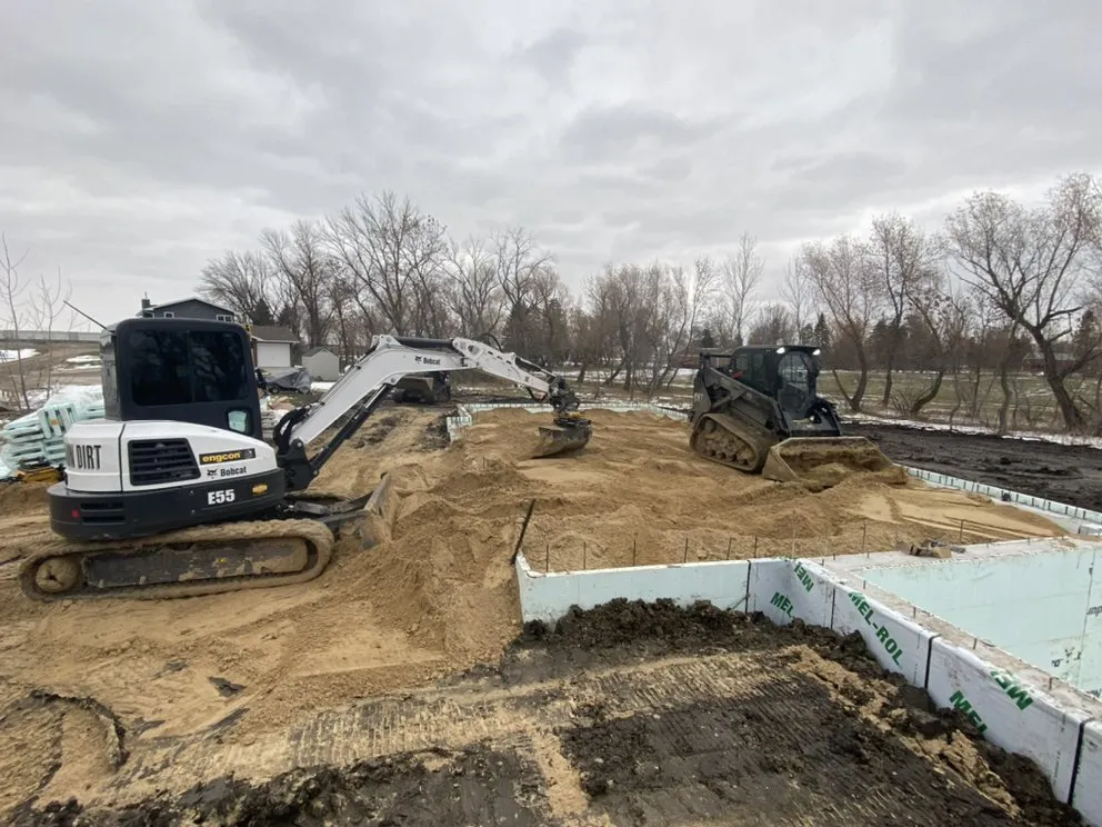 Custom outdoor landscaping for year-round maintenance in Fargo, ND by Black Iron Dirt And Demolition