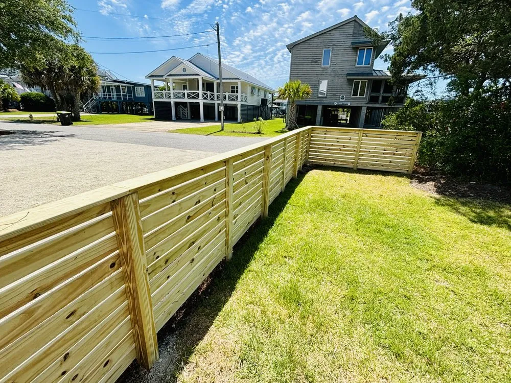 Local yard cleanup service for year-round maintenance in Pawleys Island, SC by Black River Landscape & Design