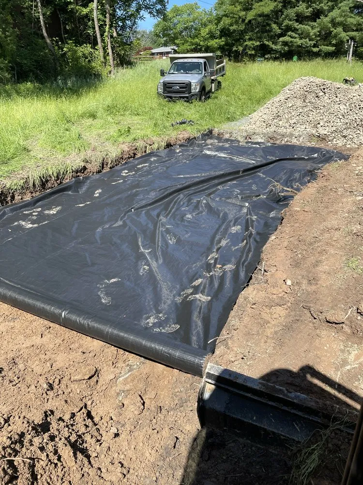 Custom outdoor landscaping with custom design across Dickson City, PA - Black Rock Excavation