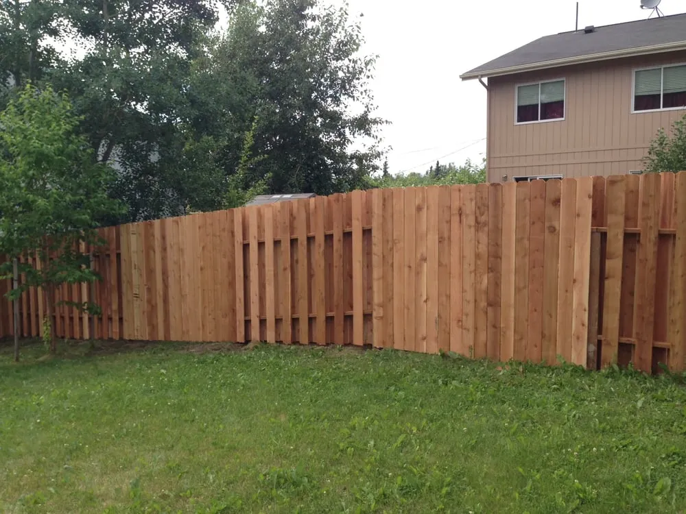 Affordable lawn mowing service for residential properties in Anchorage, AK by Black Sands Corporation