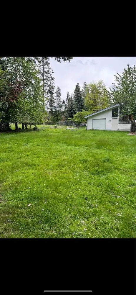 Trusted lawn mowing service for residential properties in Coeur d'Alene, ID by Black Stone Landscaping