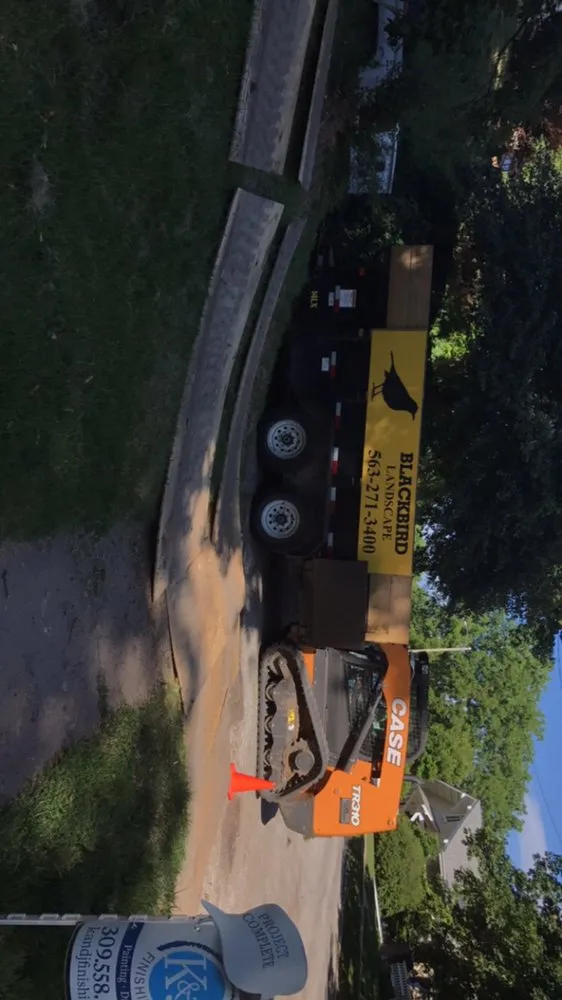 Custom yard maintenance with custom design across Bettendorf, IA - Blackbird Landscape