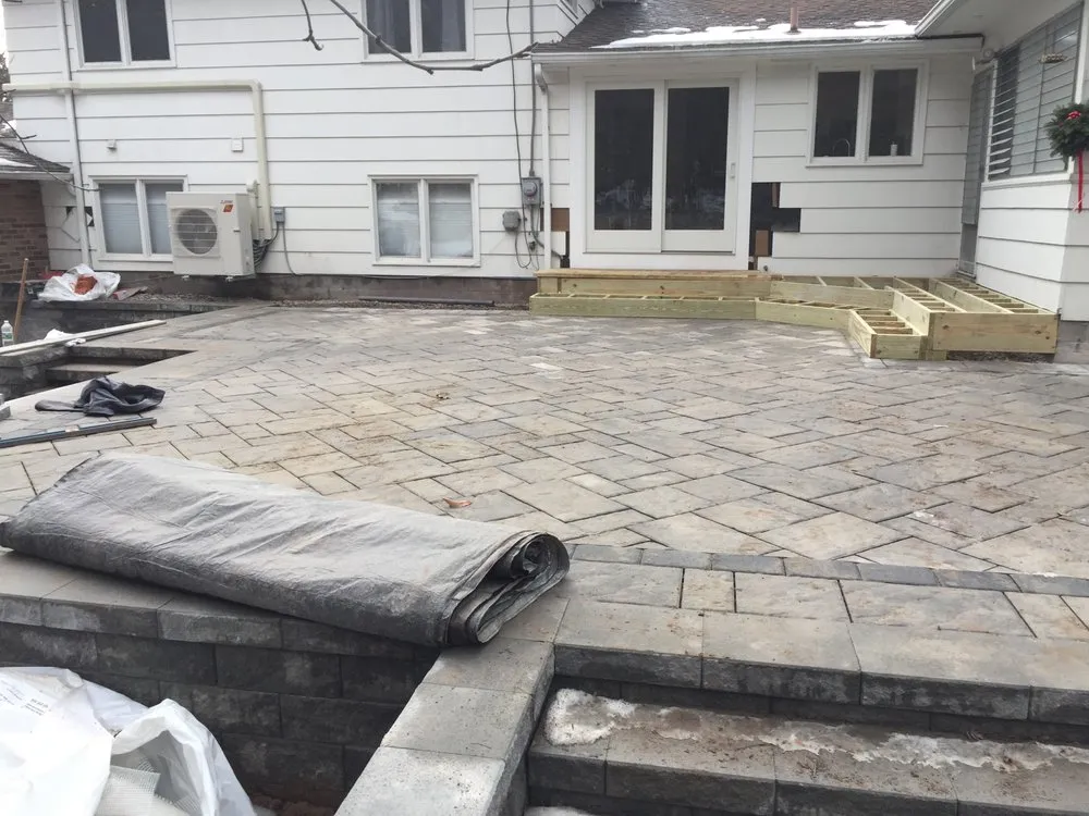 Custom landscape design for residential properties in Rochester, NY by Blackwood Management