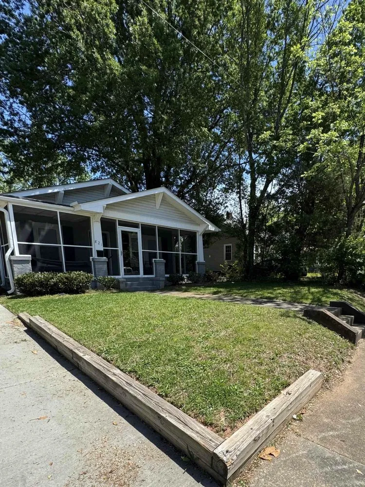 Custom lawn mowing service for residential properties across Greensboro, NC - Blade's & Bloom's