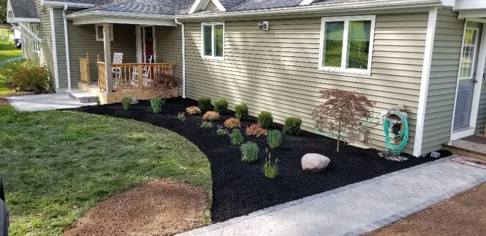 Custom lawn care service for outdoor upgrades in Lyons, NY by Blades & Spades Landscaping