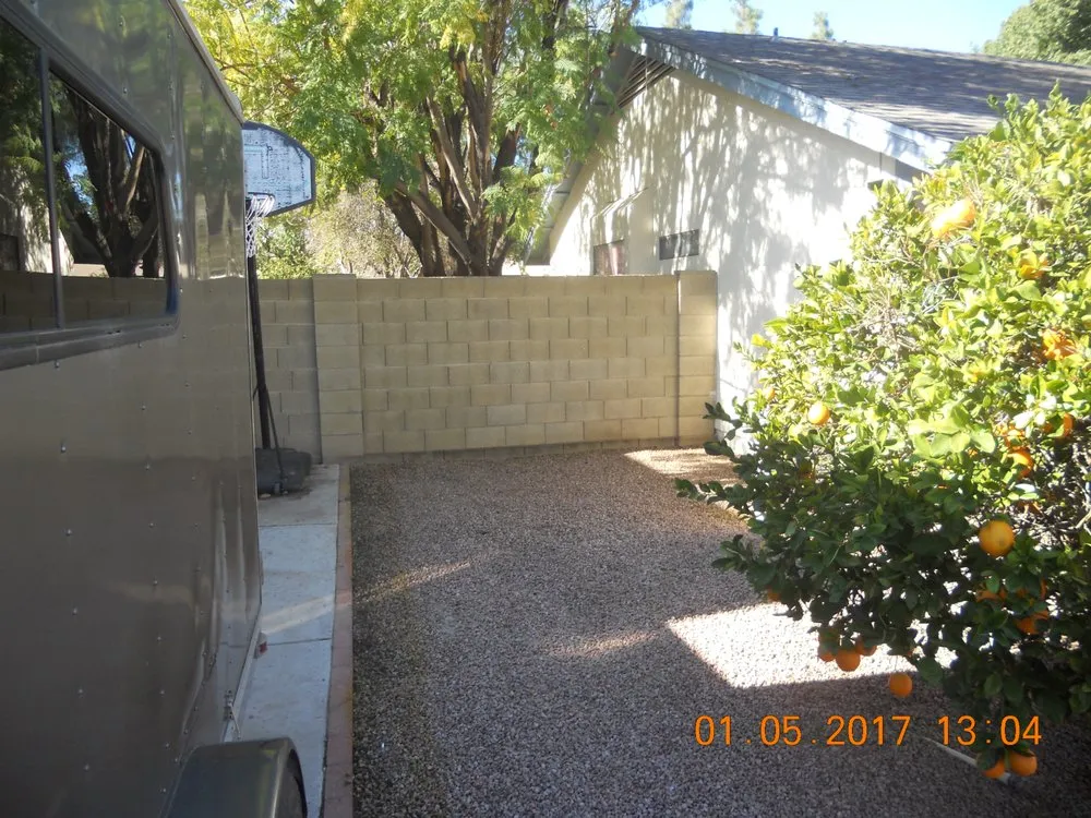 Custom garden landscaping with custom design across Apache Junction, AZ - BLADES Desert Lawn Care & Pool Service