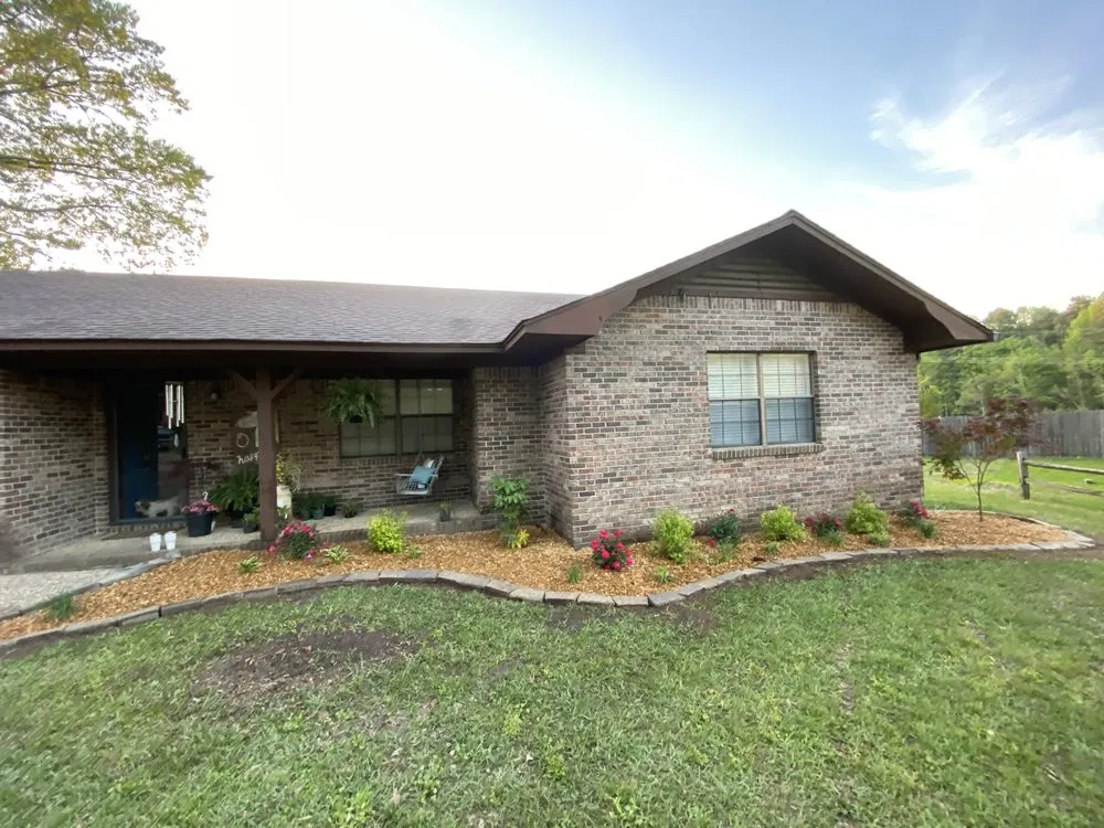 Custom residential landscaping in Hampton, AR by Blades Of Glory