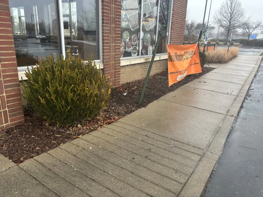 Affordable yard maintenance with custom design in Louisville, KY by Blades of Glory