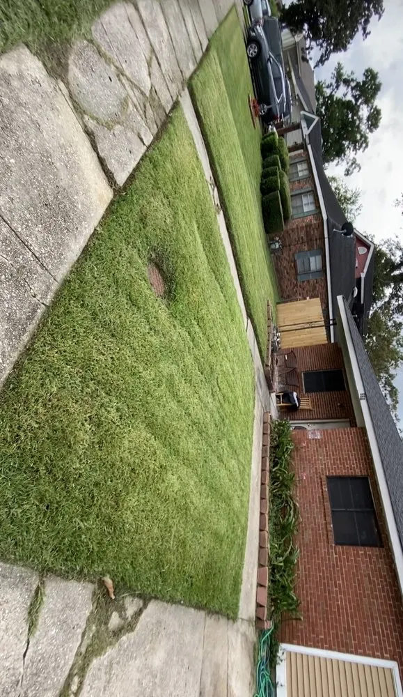 Top-rated yard cleanup service with custom design in Westwego, LA by Blades of Grace Landscaping