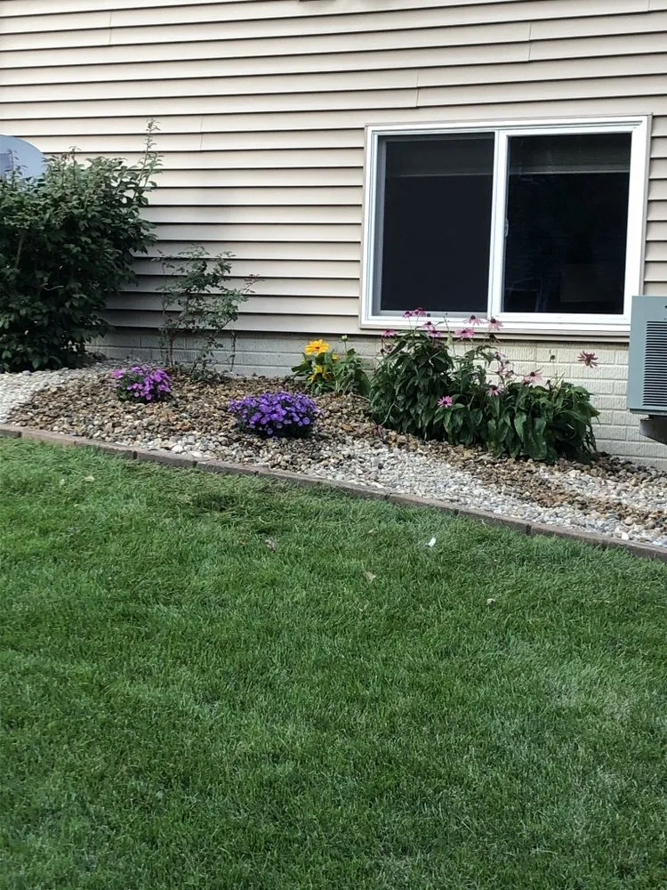 Trusted outdoor landscaping for residential properties in North Liberty, IA by Bladz Lawn Service