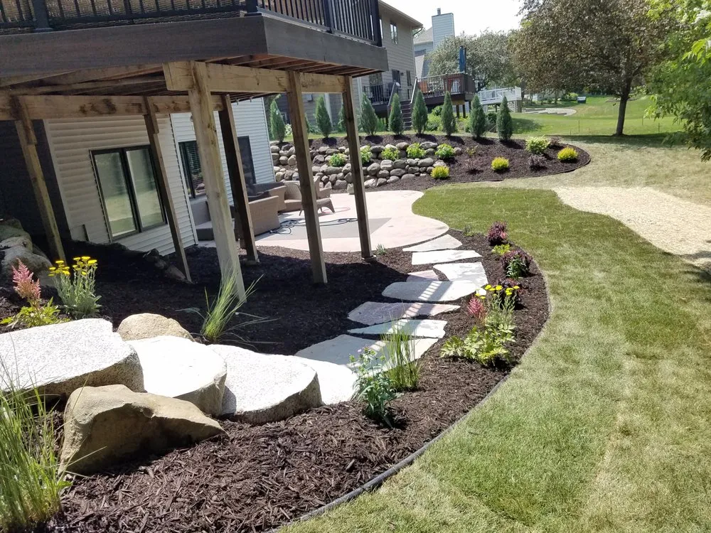 Professional landscape installation for beautiful yards in Northfield, MN by Blake's Lawn Care