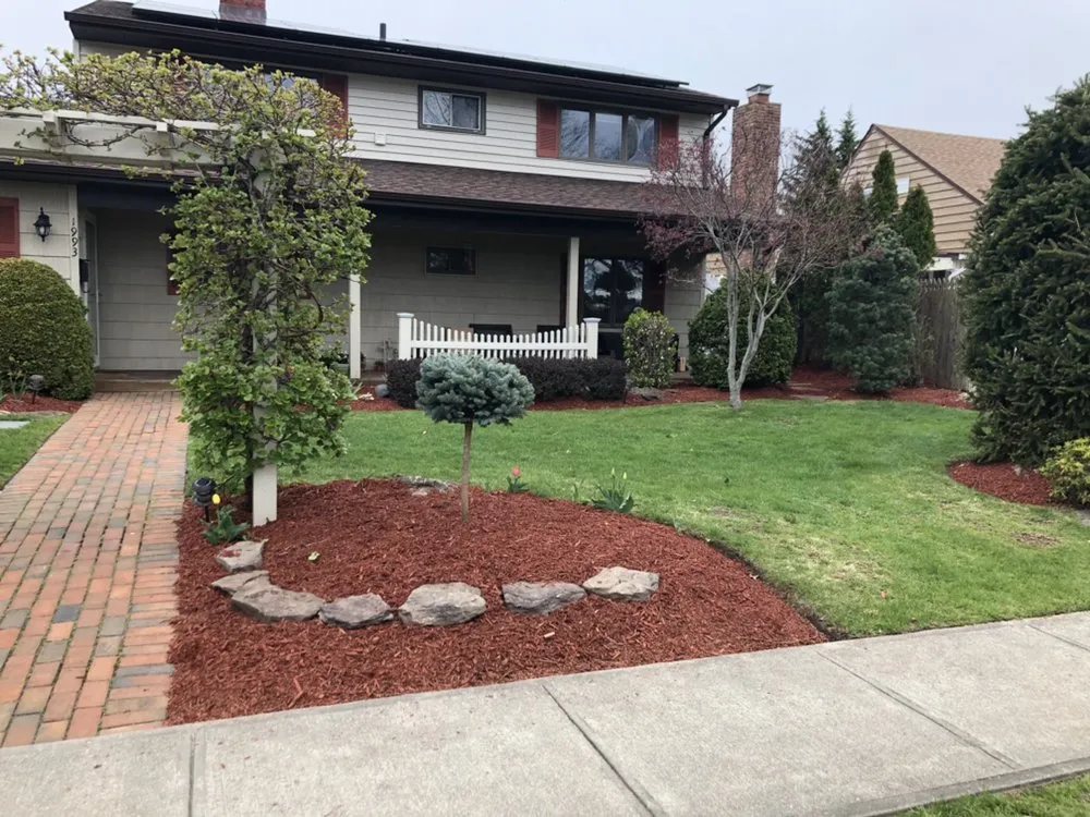 Custom yard cleanup service for year-round maintenance in Westbury, NY by Blanco's Landscape Designs