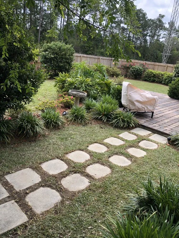 Professional yard cleanup service for residential properties across Moss Point, MS - Bless The Land