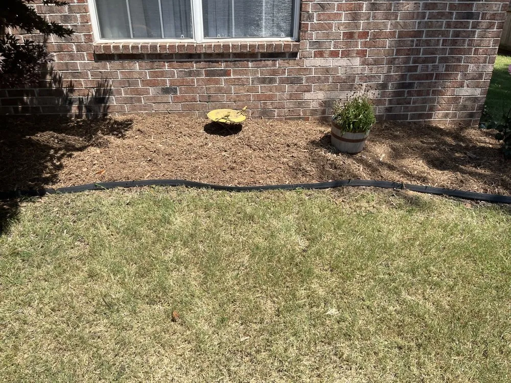 Professional yard maintenance for homes in Fayetteville, AR by Blessed Family
