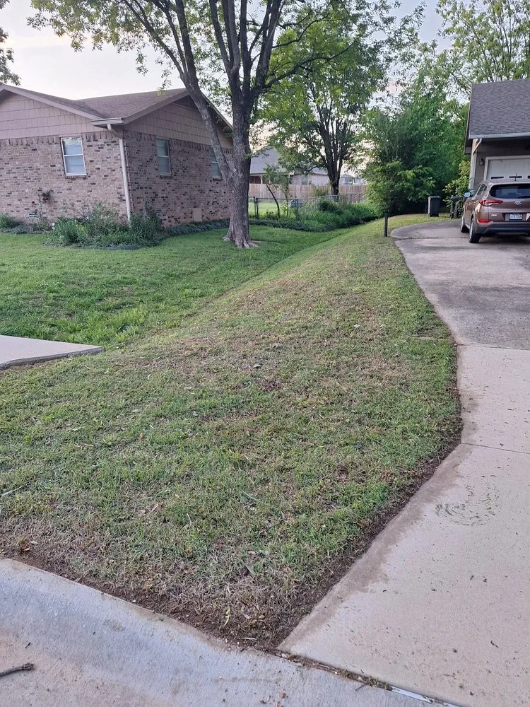 Professional lawn care service for residential properties across Fayetteville, AR - Blessed Family Mowing