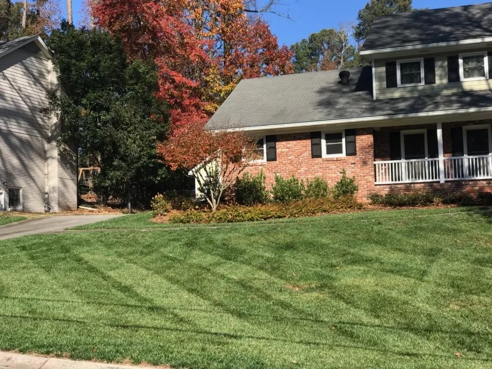 Professional lawn mowing service for residential properties in Atlanta, GA by Blissful Lawns
