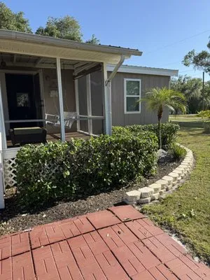 Bloom & Blade Lawn Services Logo