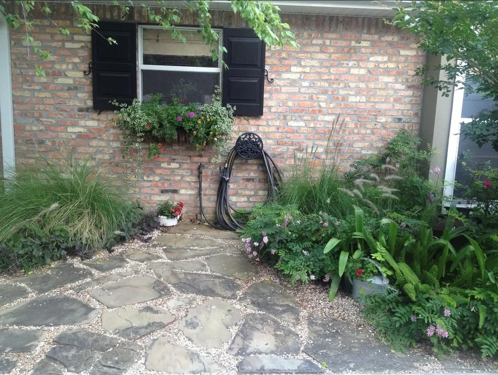 Custom yard maintenance for residential properties in New Orleans, LA by Blooming Gardens