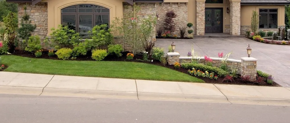 Trusted lawn care service for residential properties in Austin, TX by BLOOMING SEASONS