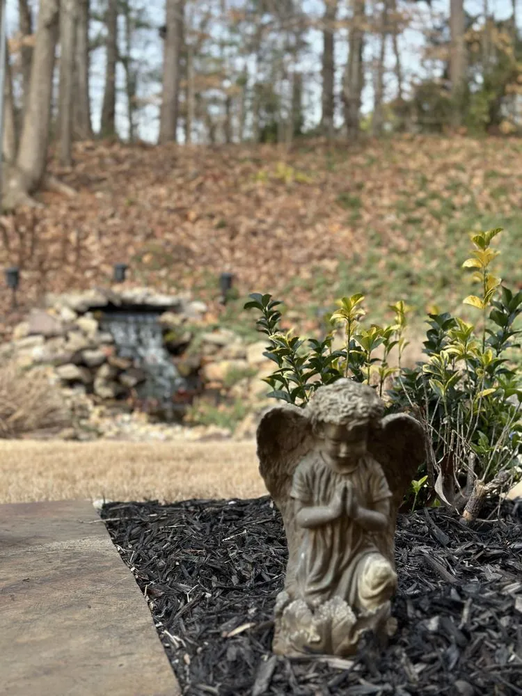 Reliable lawn mowing service with custom design in Snellville, GA by Blooms Lawn Maintenance & Design