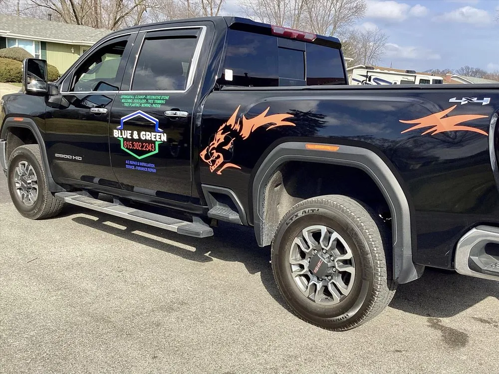 Professional lawn mowing service in Joliet, IL by Blue & Green #1 Services - Landscaping and HVAC