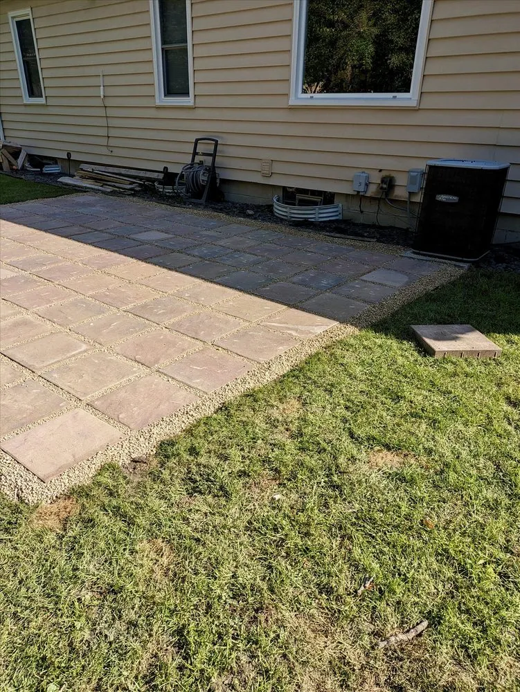 Trusted yard cleanup service for residential properties in Joliet, IL by Blue & Green #1 Services - Landscaping and HVAC