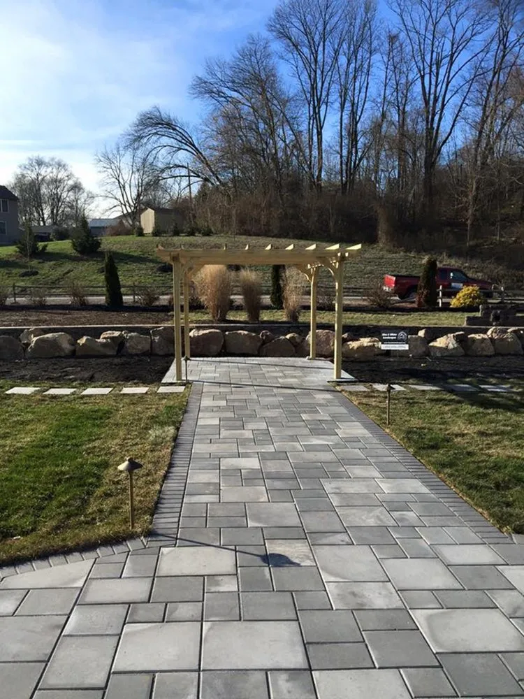 Local lawn care service for residential properties in Norristown, PA by Blue and White Landscapes