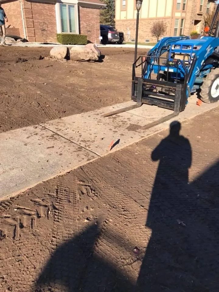 Top-rated lawn care service in Manchester, MI by Blue Arrow Landscape