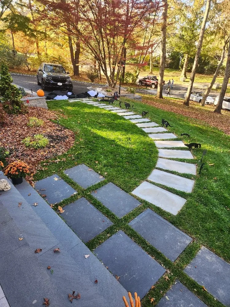 Trusted lawn mowing service for year-round maintenance in Bay Shore, NY by Blue Bay Outdoor Solutions