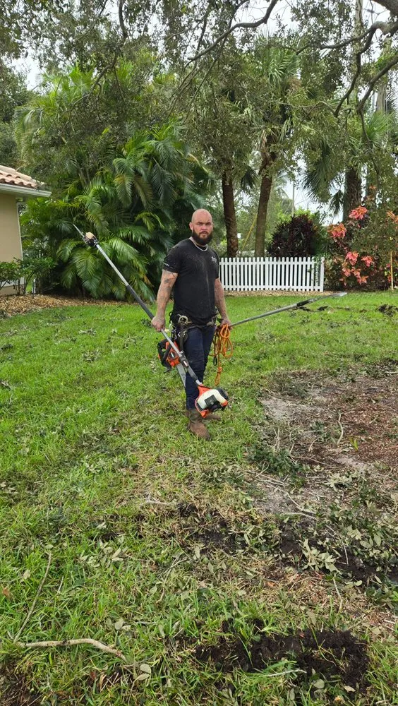 Custom landscape installation for residential properties in Vero Beach, FL by Blue Collar Broke Trees