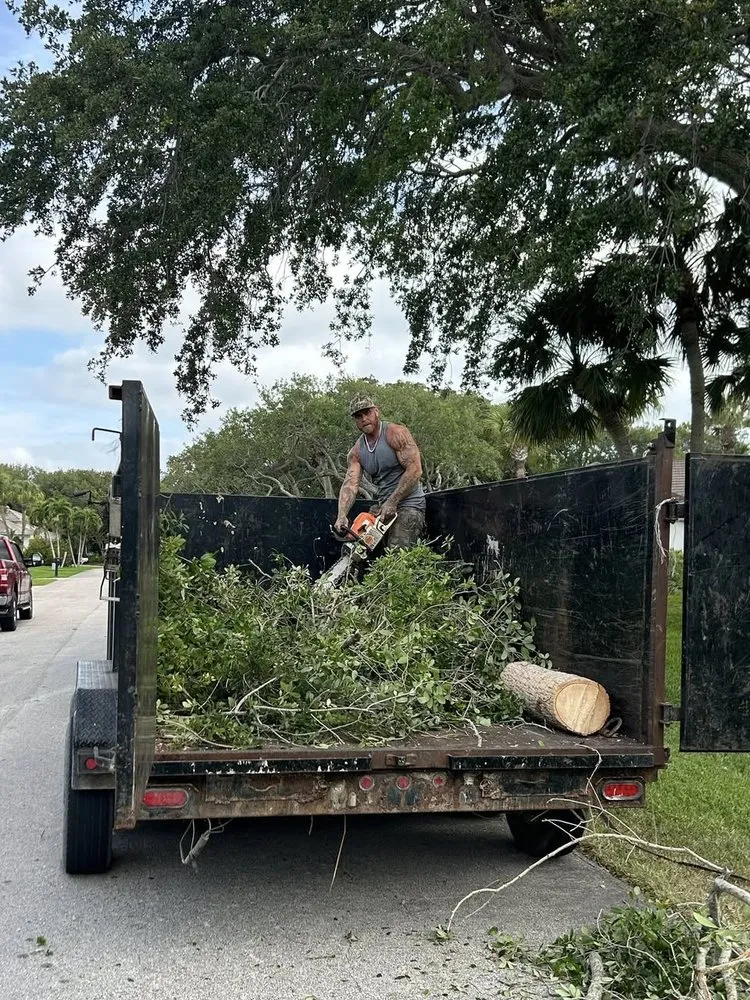 Custom garden landscaping for homes in Vero Beach, FL by Blue Collar Broke Trees