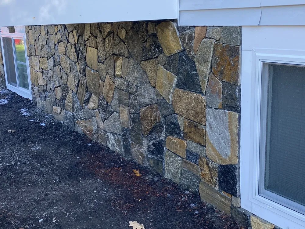 Custom lawn mowing service in Clinton, MA by Blue Costa Landscape & Construction