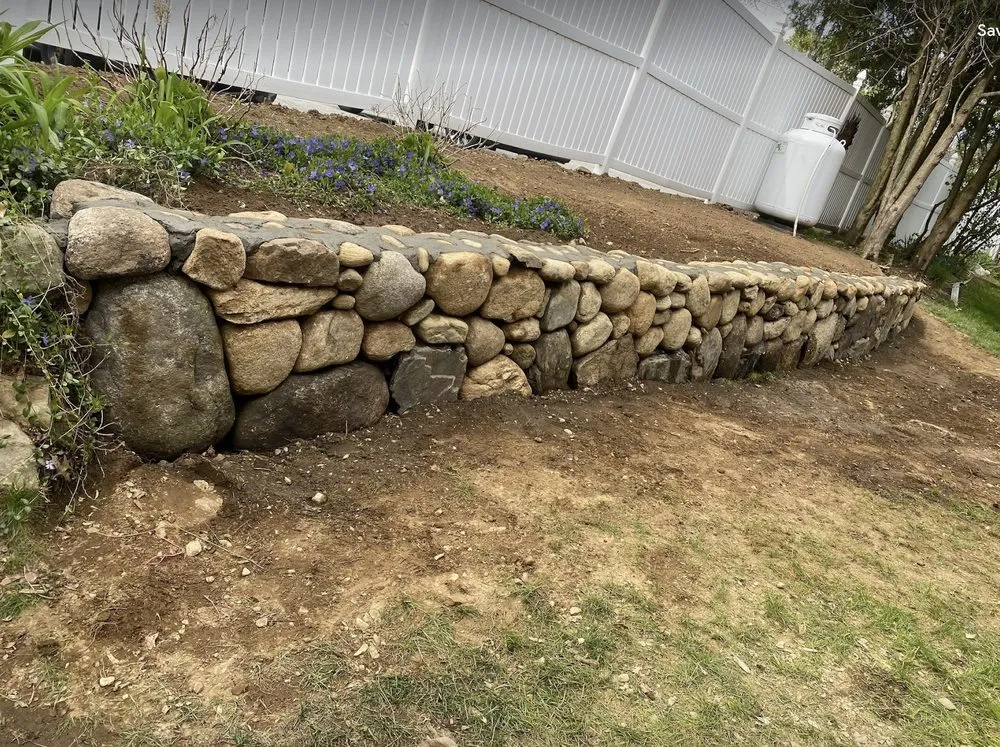 Affordable yard maintenance for year-round maintenance in Clinton, MA by Blue Costa Landscape & Construction