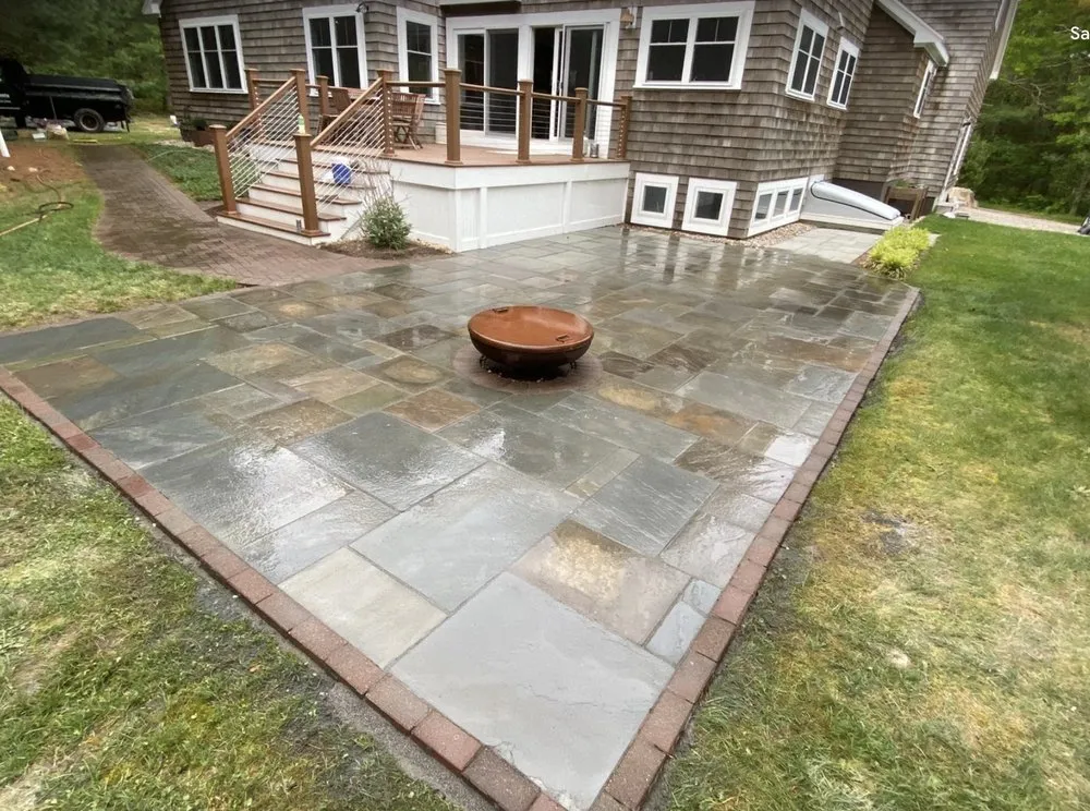 Affordable lawn mowing service for residential properties in Clinton, MA by Blue Costa Landscape & Construction