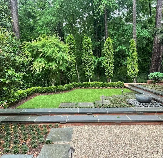 Trusted yard maintenance for residential properties in Powder Springs, GA by Blue Fossill