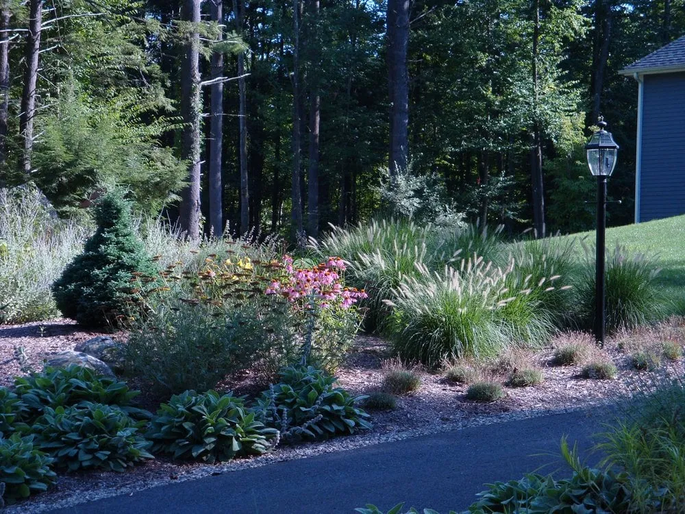 Trusted lawn mowing service for beautiful yards in Simsbury, CT by Blue Heron Landscape Design LLC