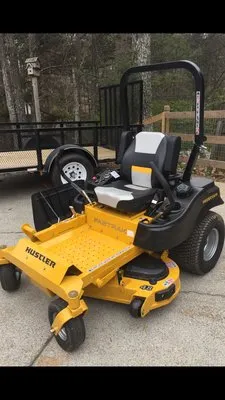 Blue Ribbon Lawn Care Logo