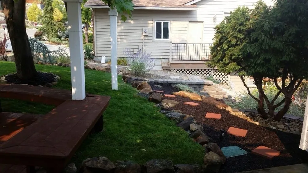 Custom outdoor landscaping for outdoor upgrades across Boise, ID - Blue summer lawn care