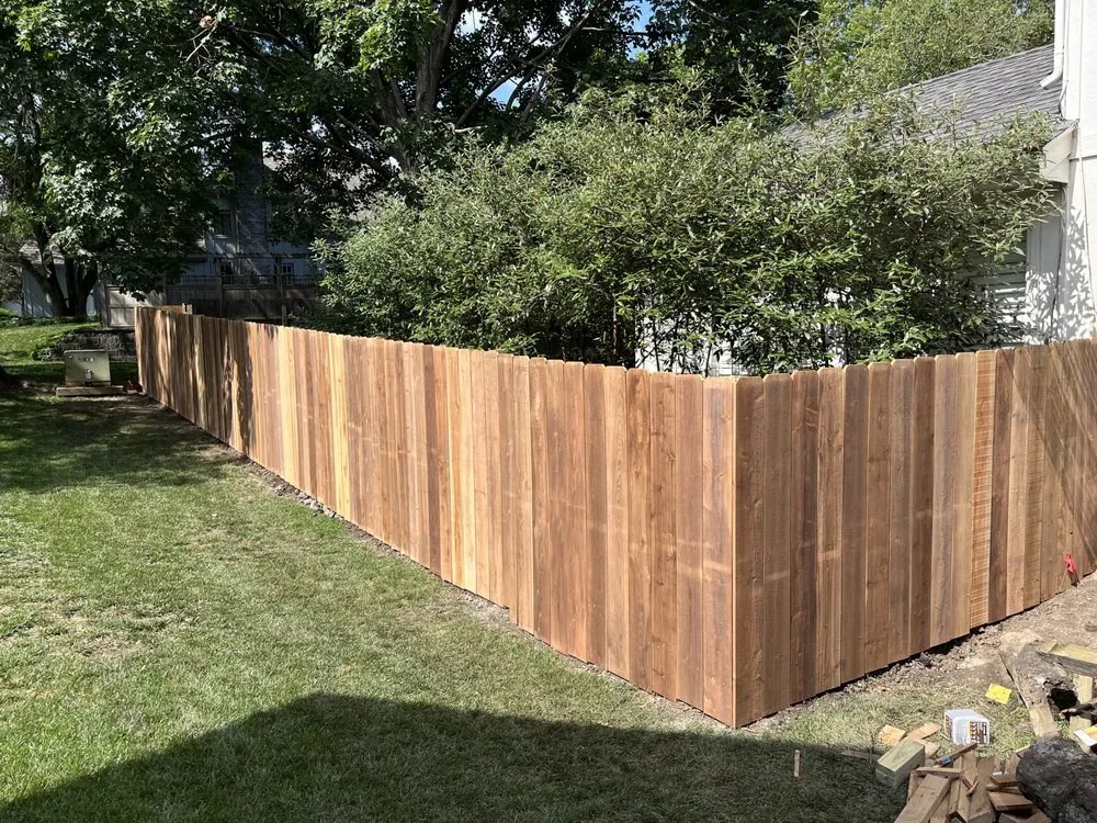 Professional yard maintenance for homes in Mission, KS by Bluebird Outdoors