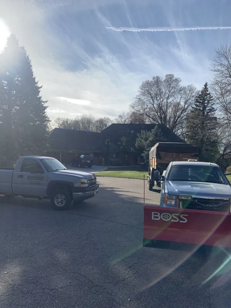 Reliable lawn mowing service for year-round maintenance in Burnsville, MN by Bluegrass Outdoor Services