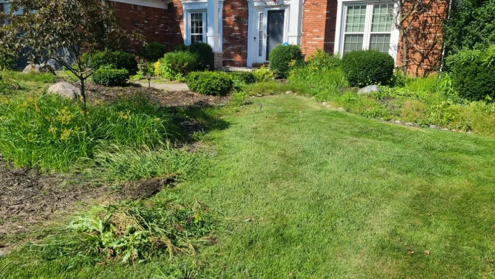 Custom lawn mowing service for outdoor upgrades in Waterford Township, MI by BlueStone Earthworks