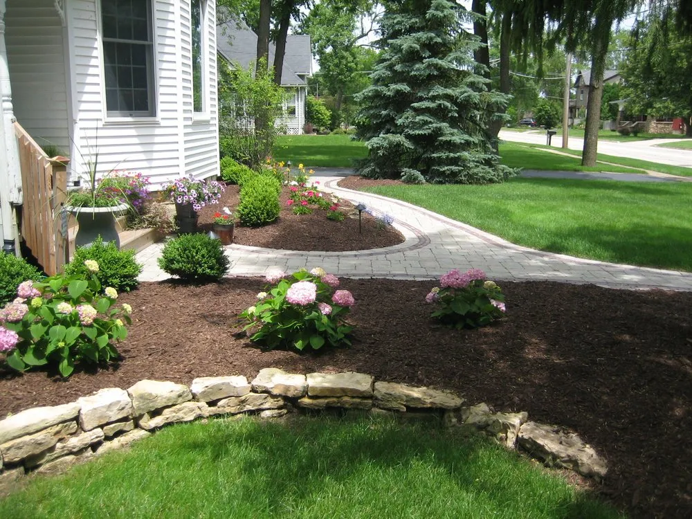 Local residential landscaping for year-round maintenance in New Lenox, IL by Bluestone Landscape