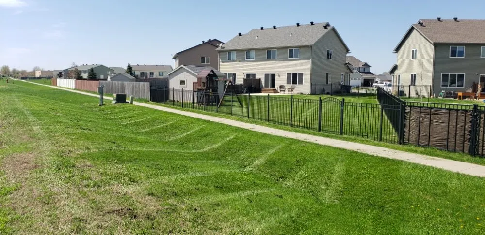 Professional yard cleanup service experts serving Fargo, ND - B&M Lawn Services