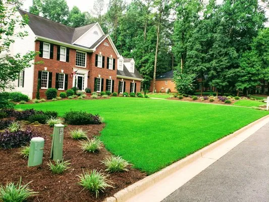 B.Moore's Enterprise Lawn Maintenance Logo